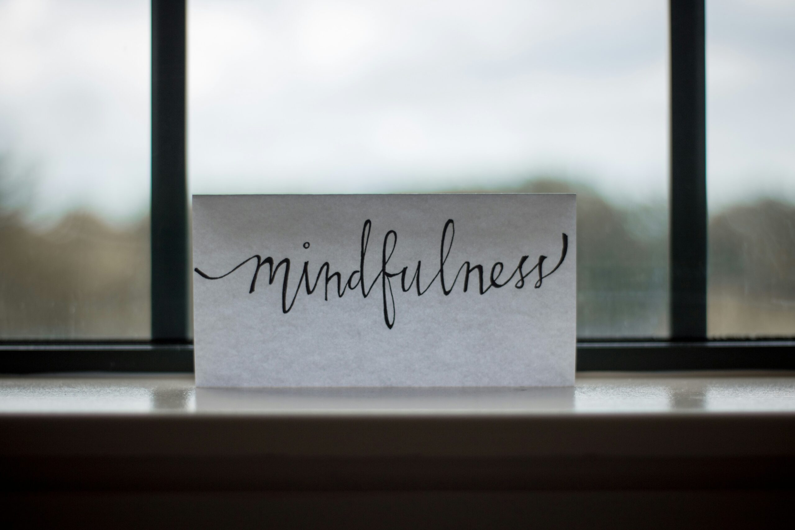 Mindfulness sign on a window