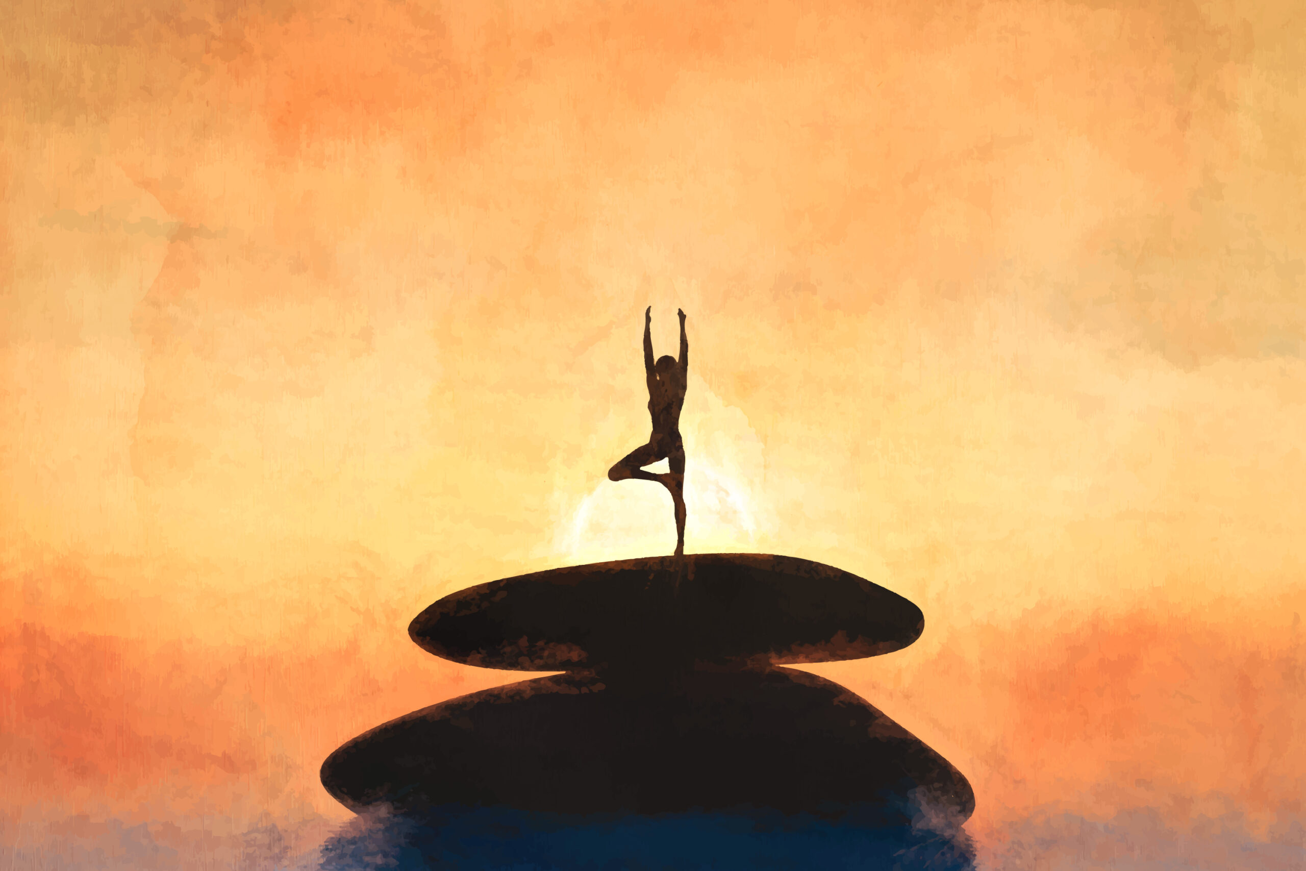 Person balancing on stacked stones at sunset