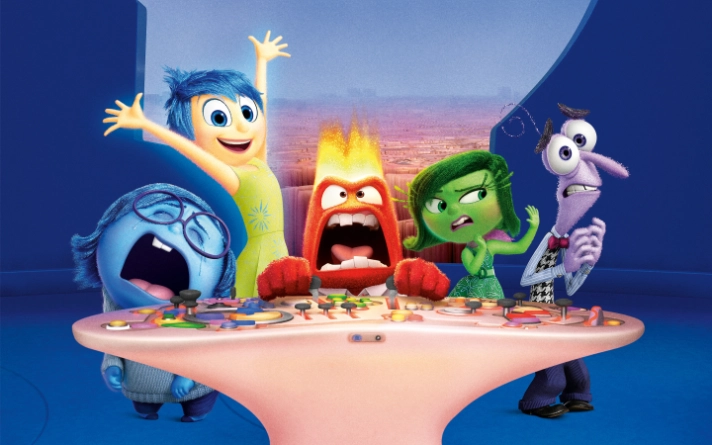 Animated characters representing emotions gathered around a table